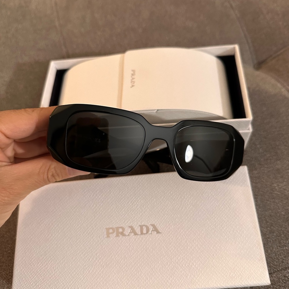 Prada symbol sunglasses used like new